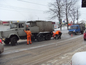 ремонт дороги в снежную погоду в Долгопрудном 