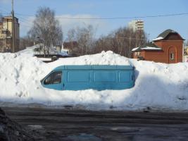 Уборка снега на дорогах в Долгопрудном