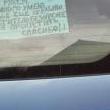 Объявление на заднем стекле машины